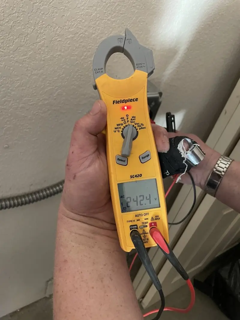 Voltage testing with clamp meter during Circuit Breaker Repair in Old Westbury